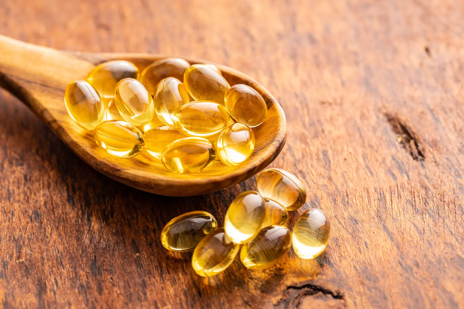 heap of vitamin D pills in a spoon