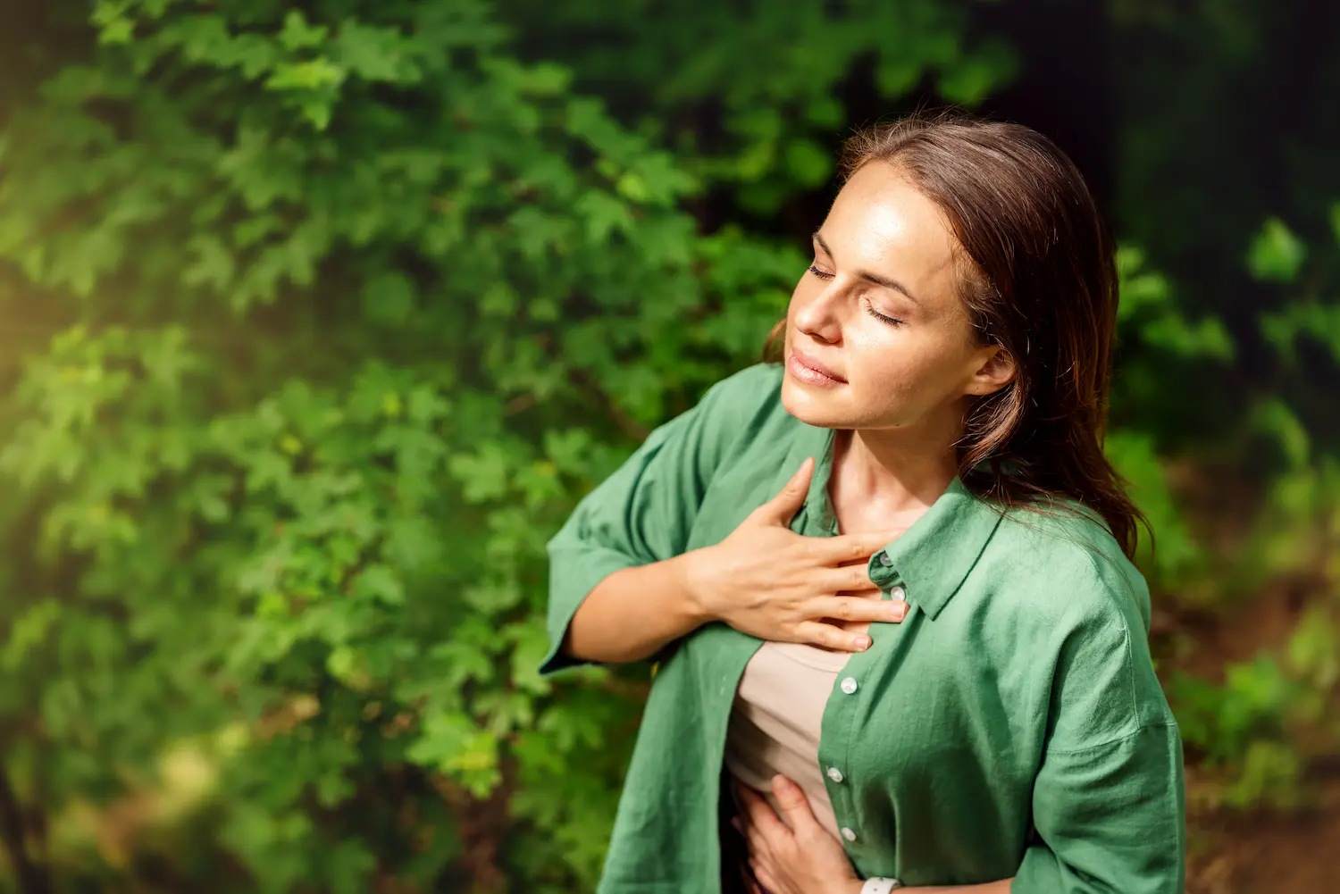 woman taking a deep breath